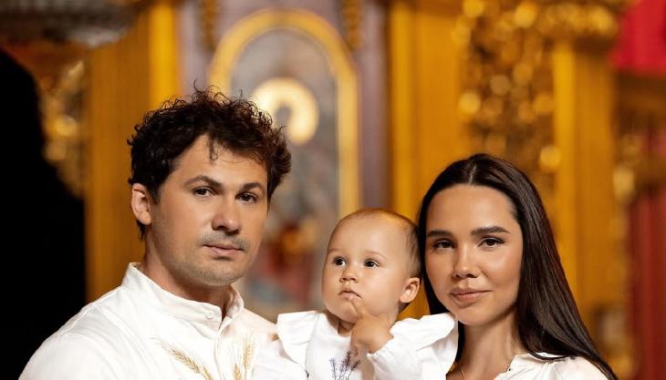 Женя Кот і Наталія Татарінцев з донькою Лелею